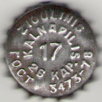 along the inner circumference: Kalnapilis 26 kap., along the outer one: Žigulinis ГОСТ 3473\u002D78.